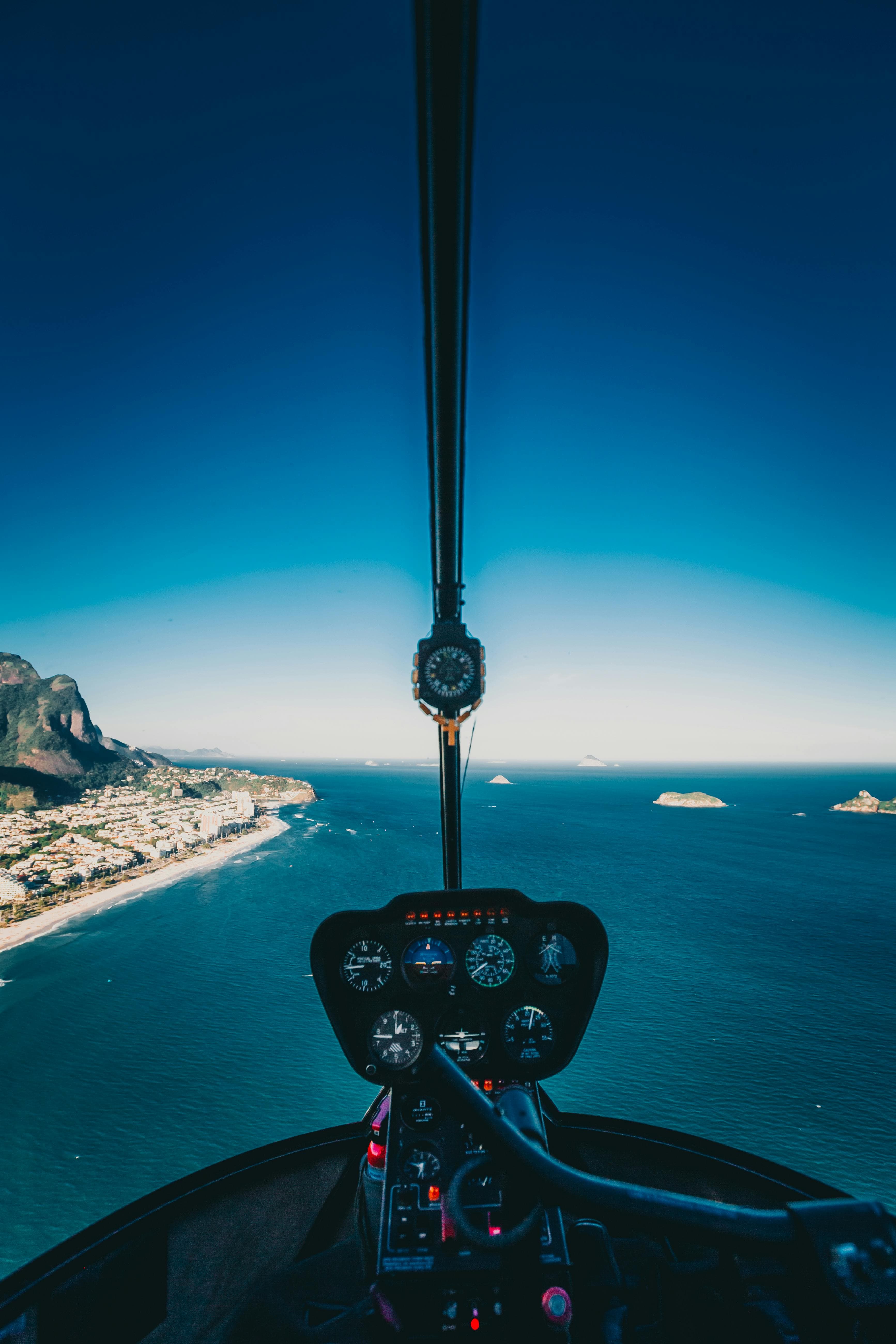 Aerial view of Ibiza coastline and Es Vedrà island from helicopter
